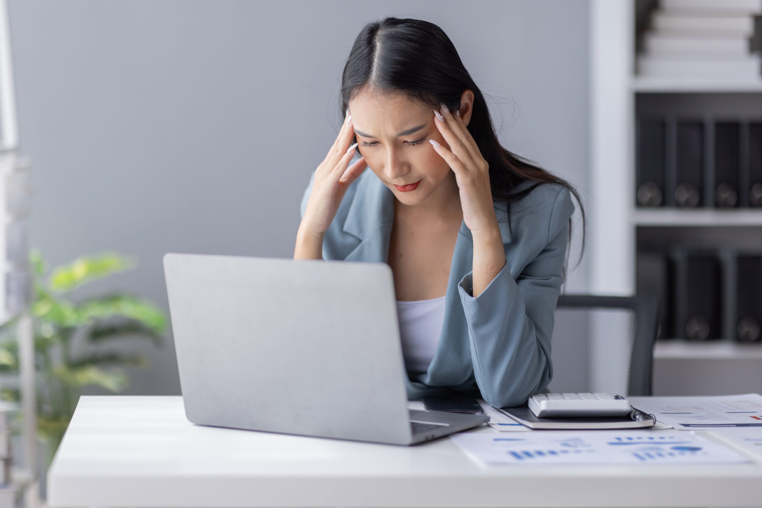 A Malaysian businesswoman frustrated with fake payment receipt scams affecting her revenue.