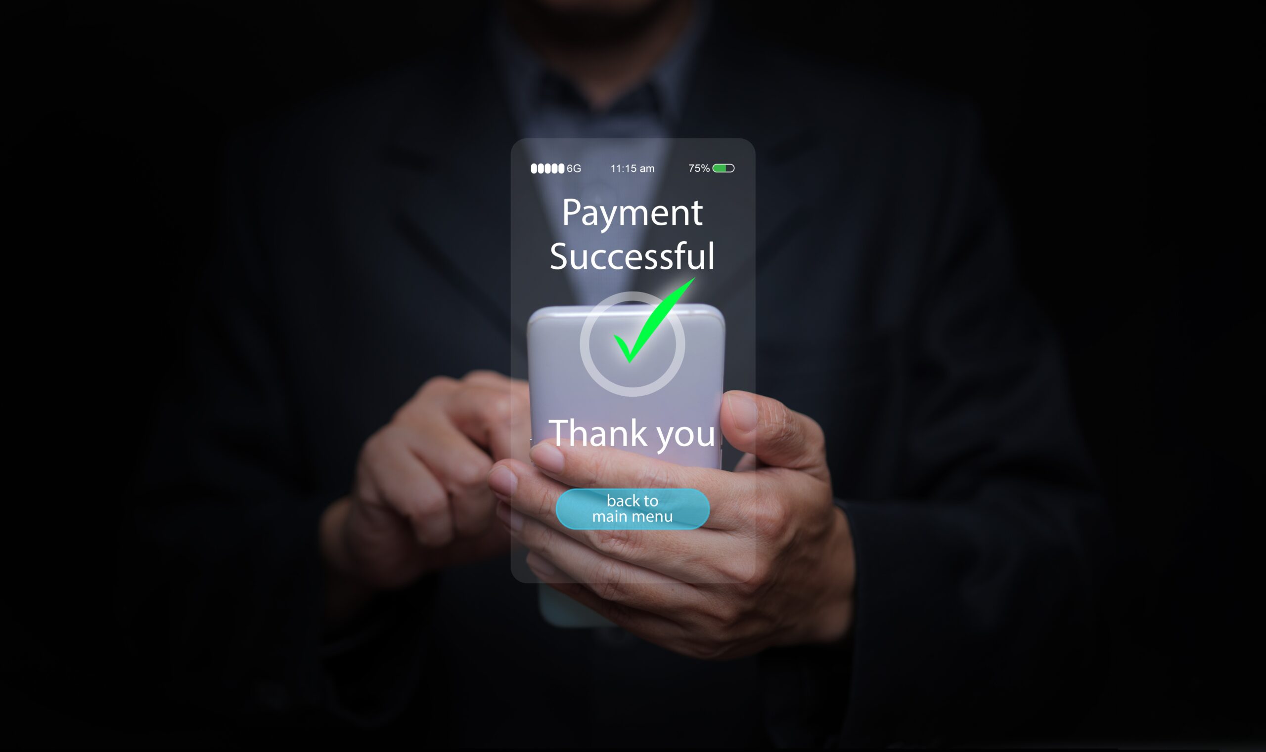 Hands holding smartphone displaying a payment successful confirmation screen